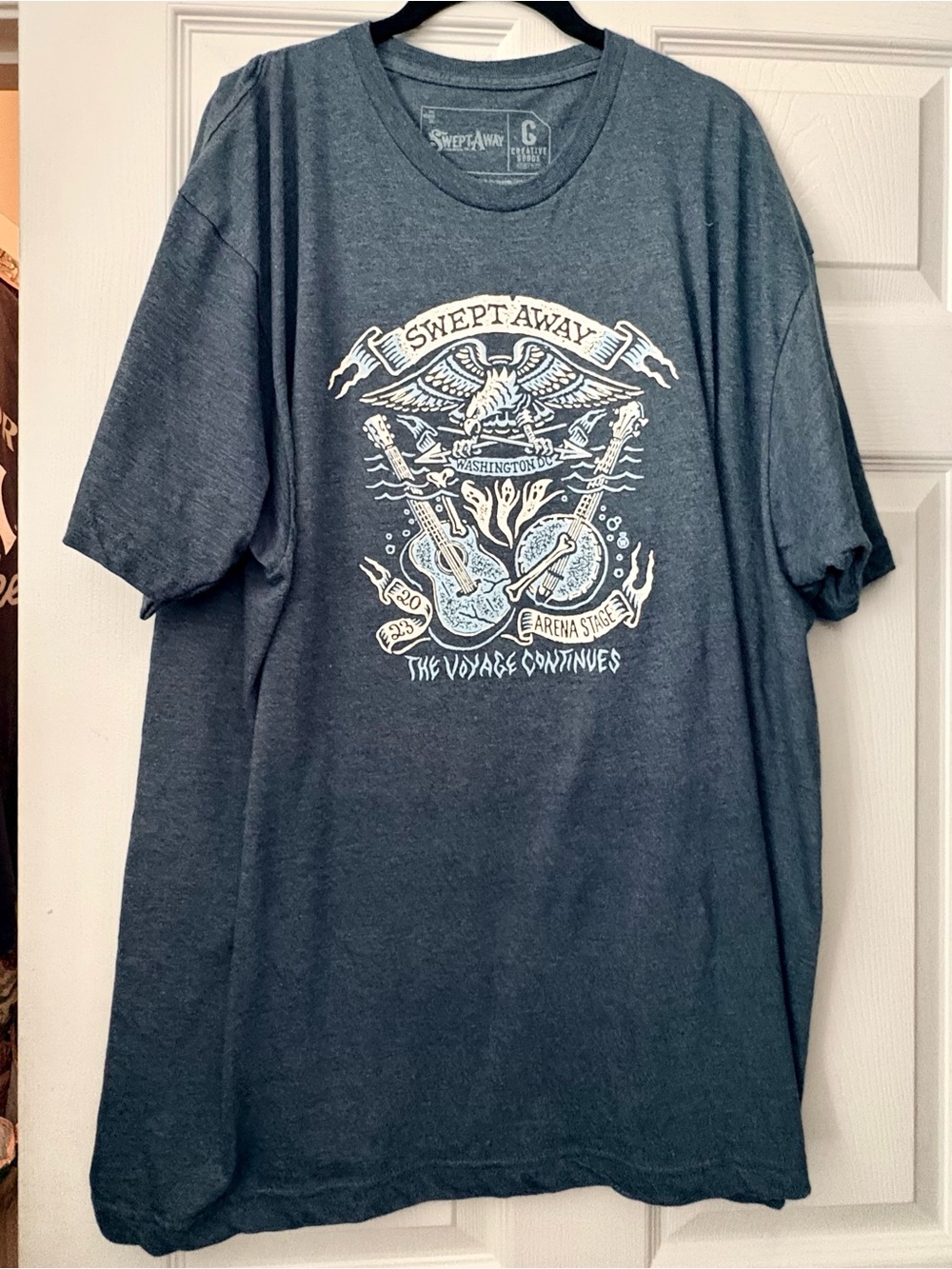 Distressed baby blue “Swept Away” Tee from musical XXL Arena Stage DC New